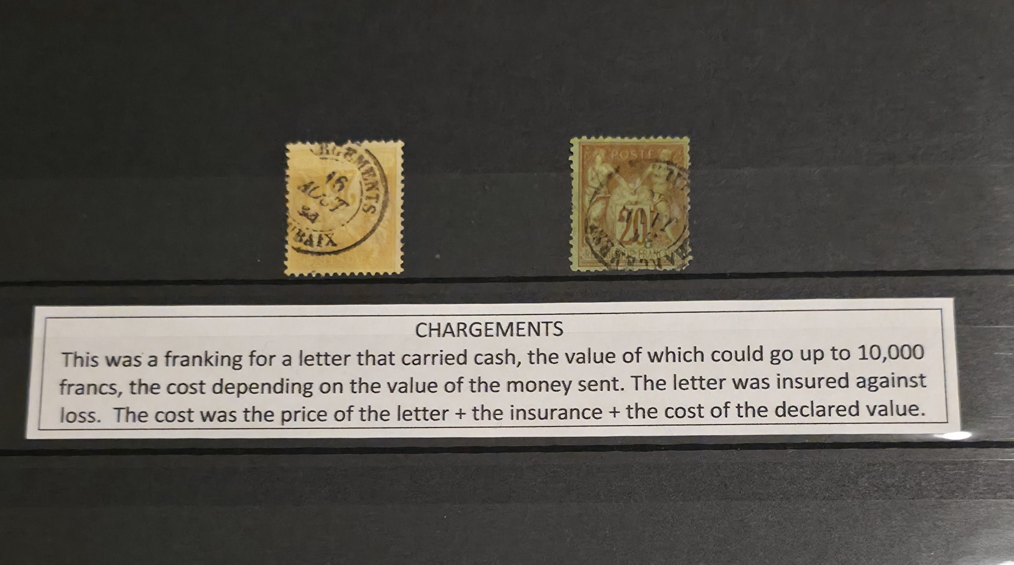 a group of postage stamps on a black background