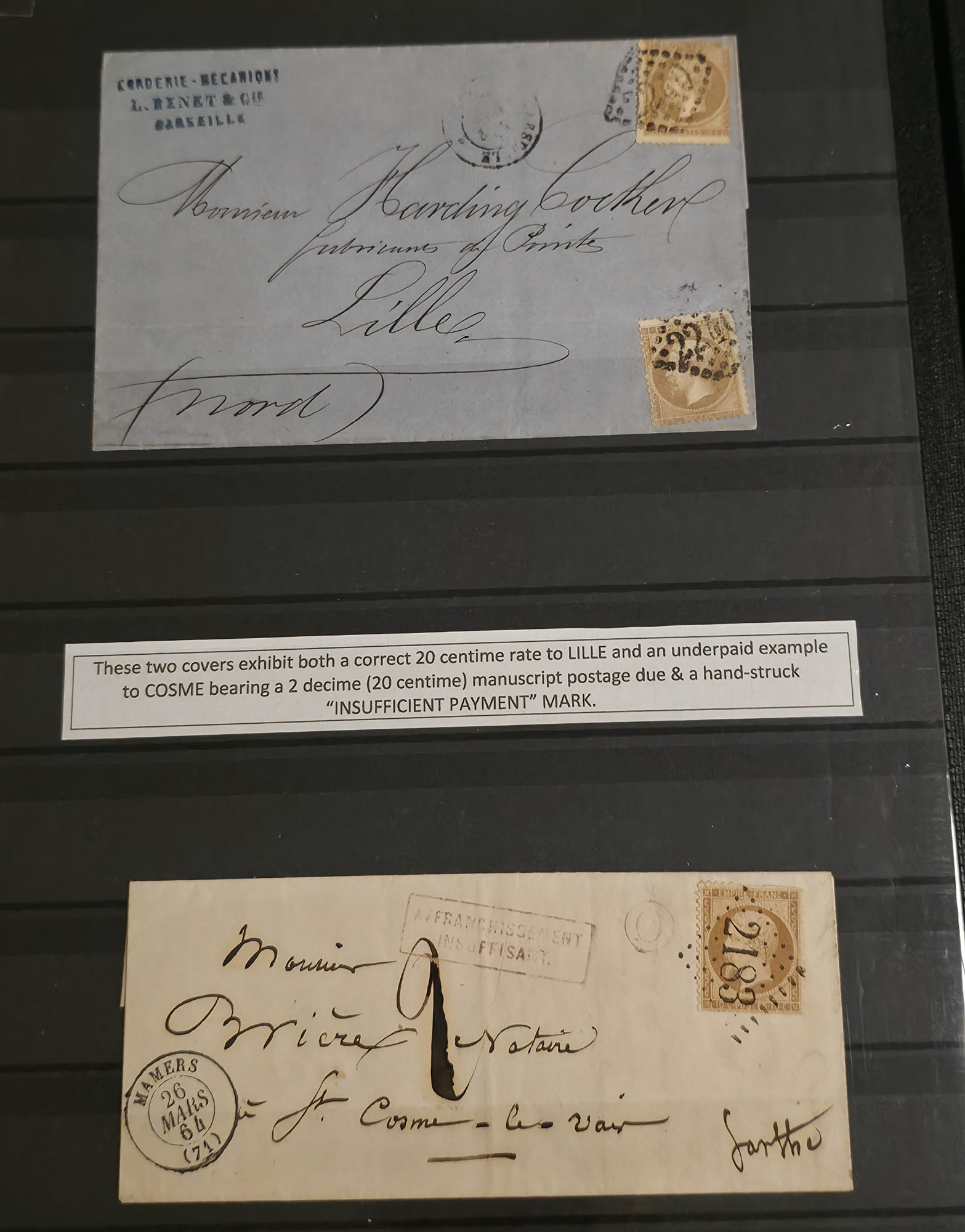 a group of envelopes on a wall