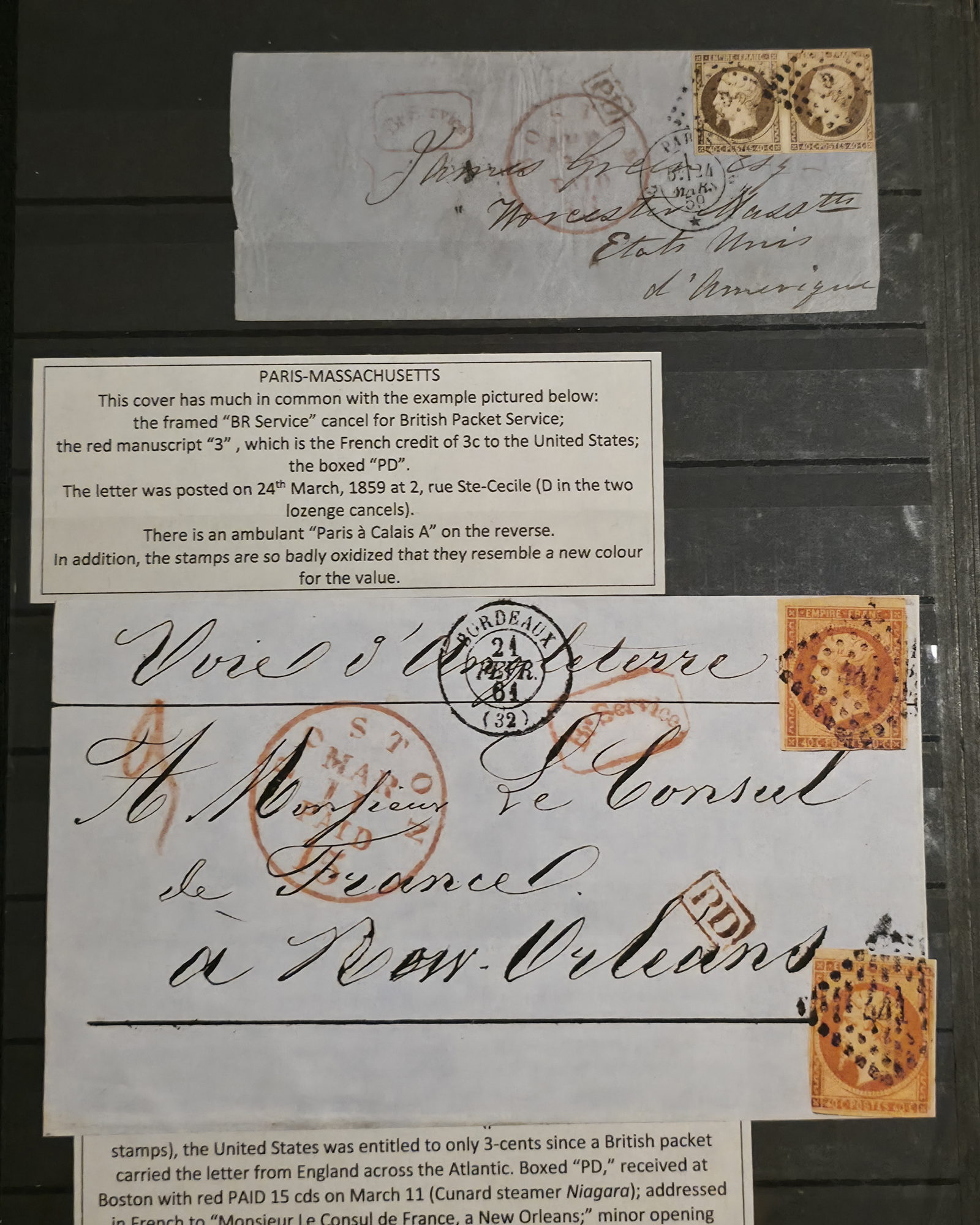 a group of envelopes on a wall