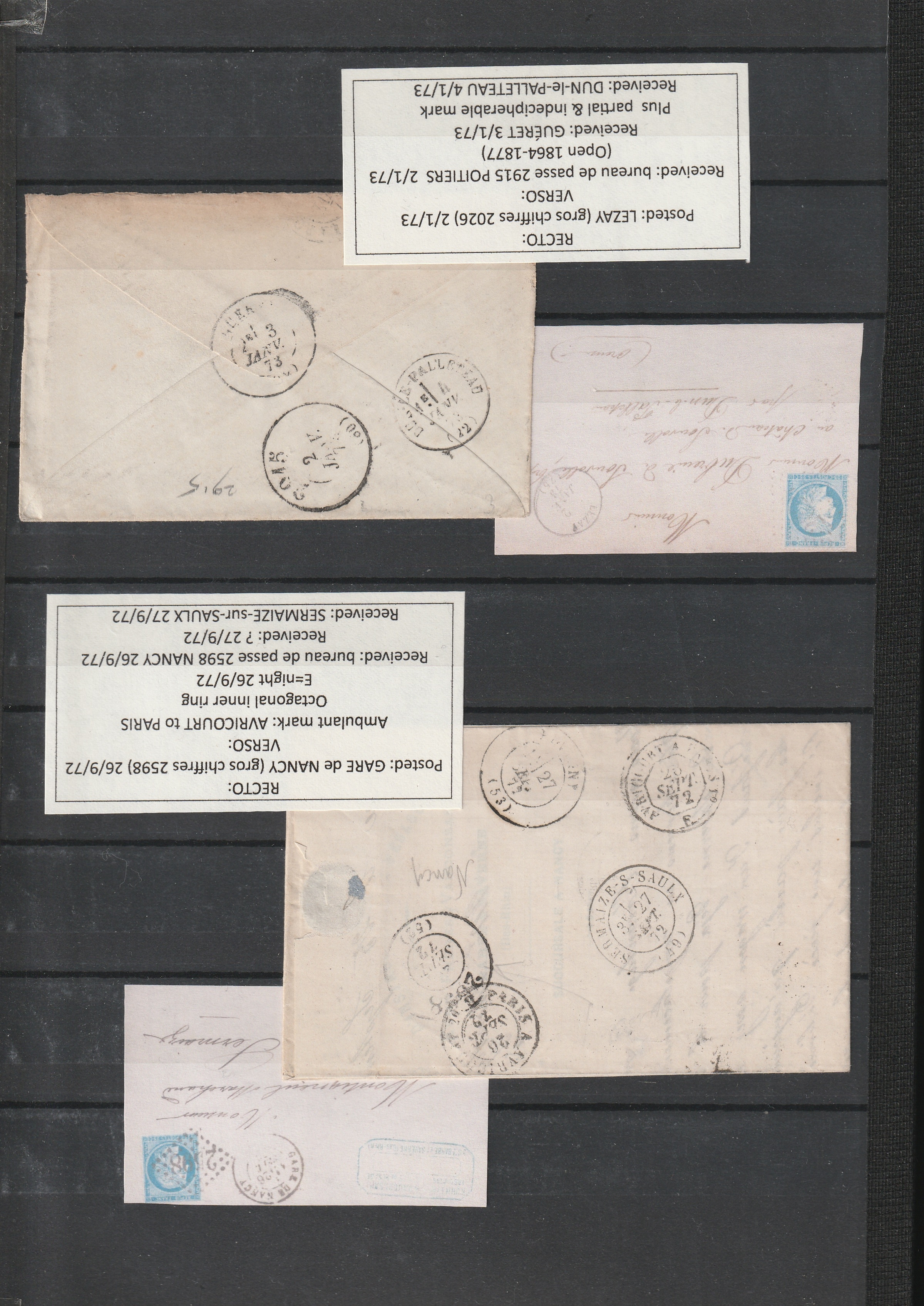 a group of envelopes with stamps