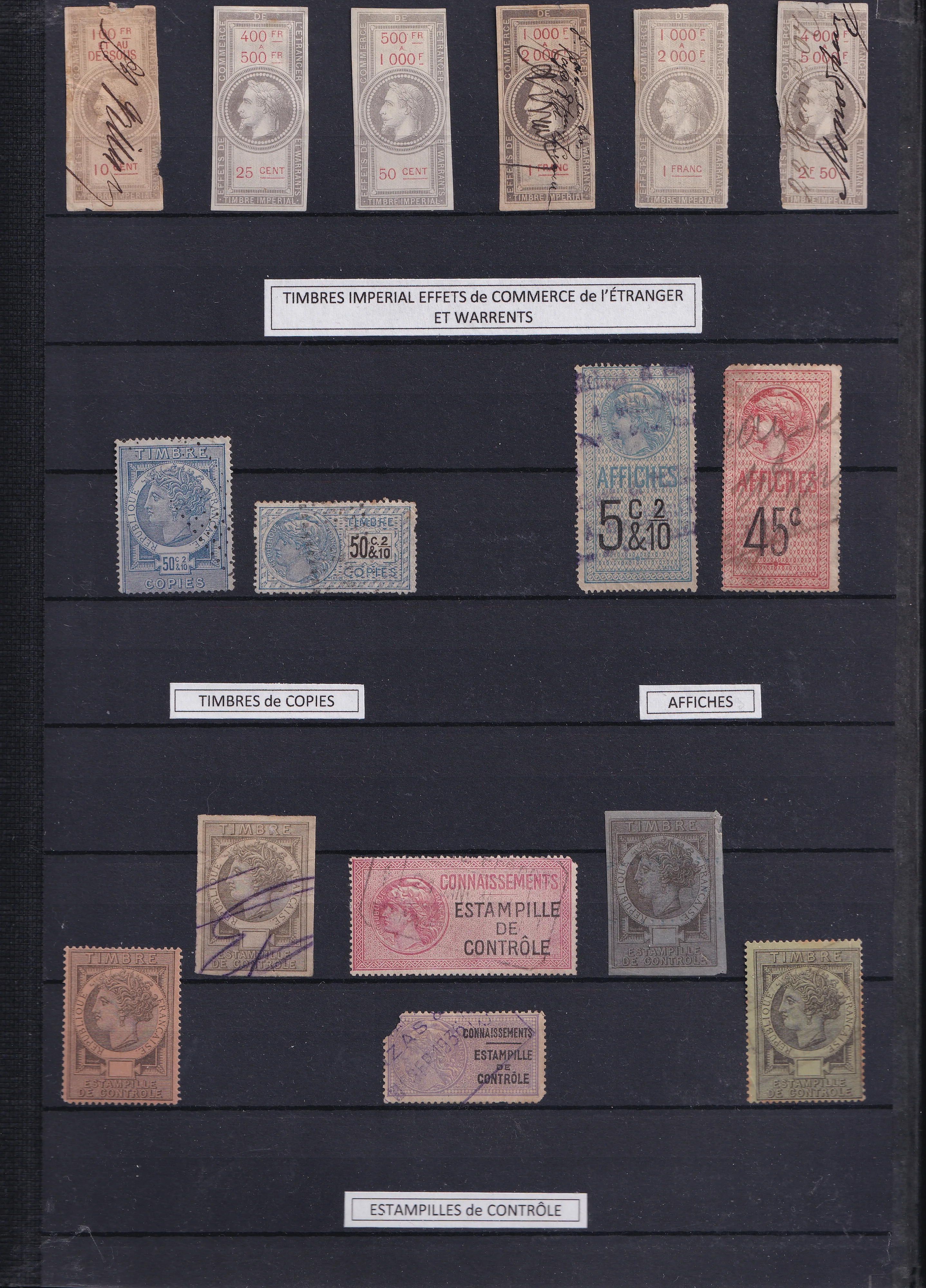 a group of postage stamps on a wall