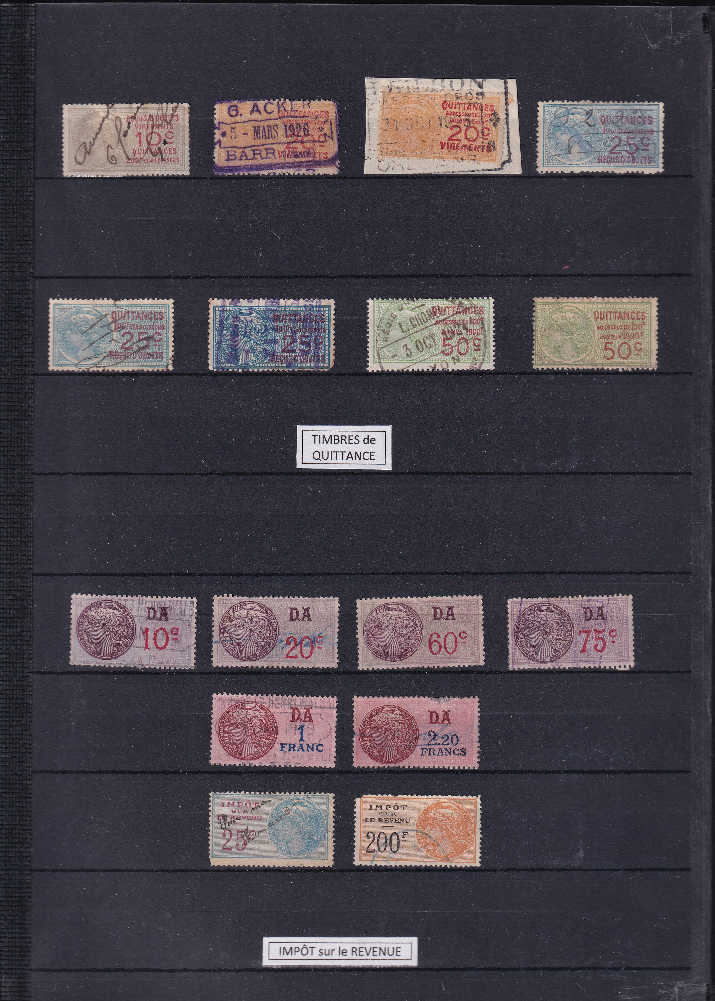 a collection of stamps on a black book