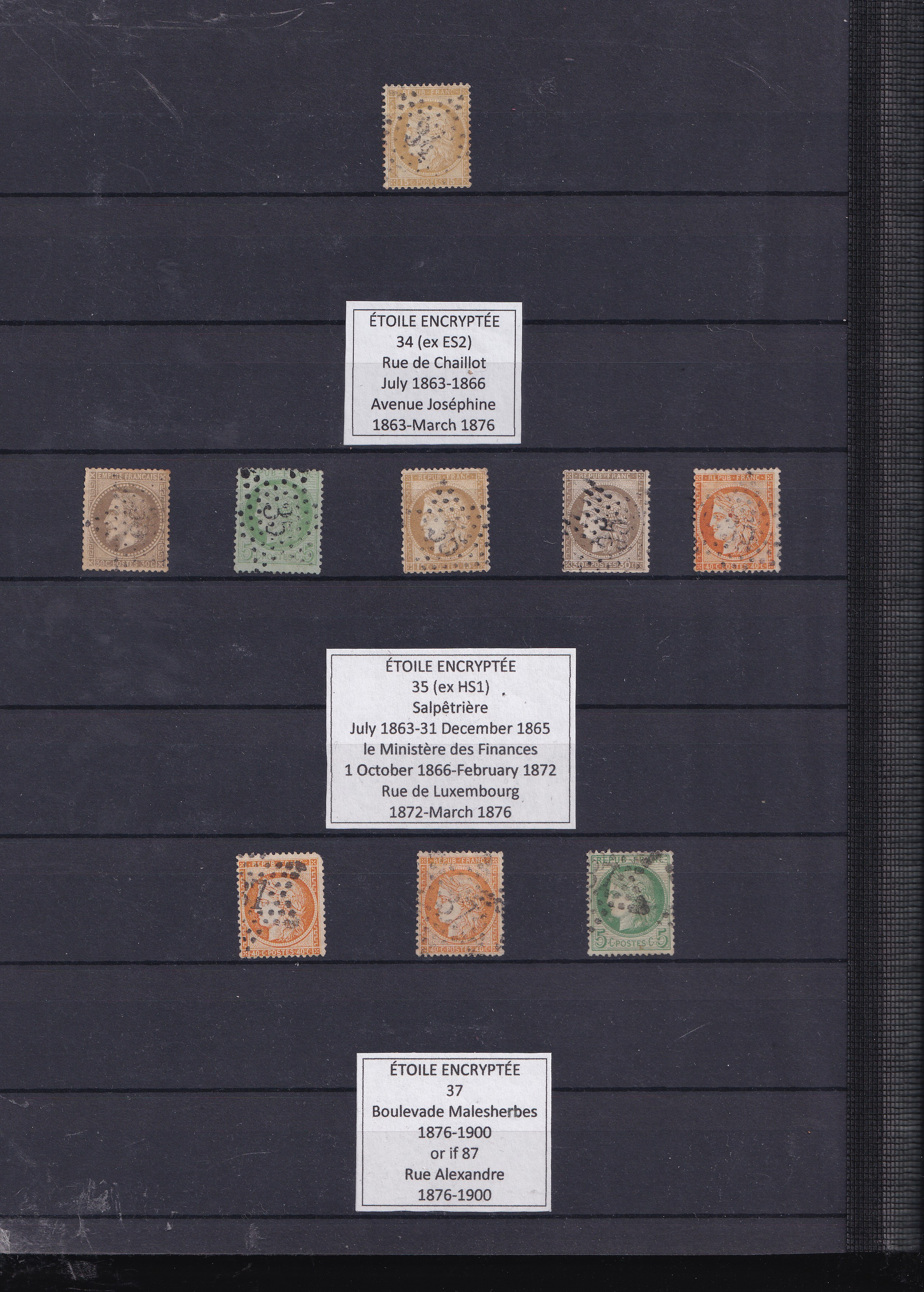 a collection of postage stamps on a black board