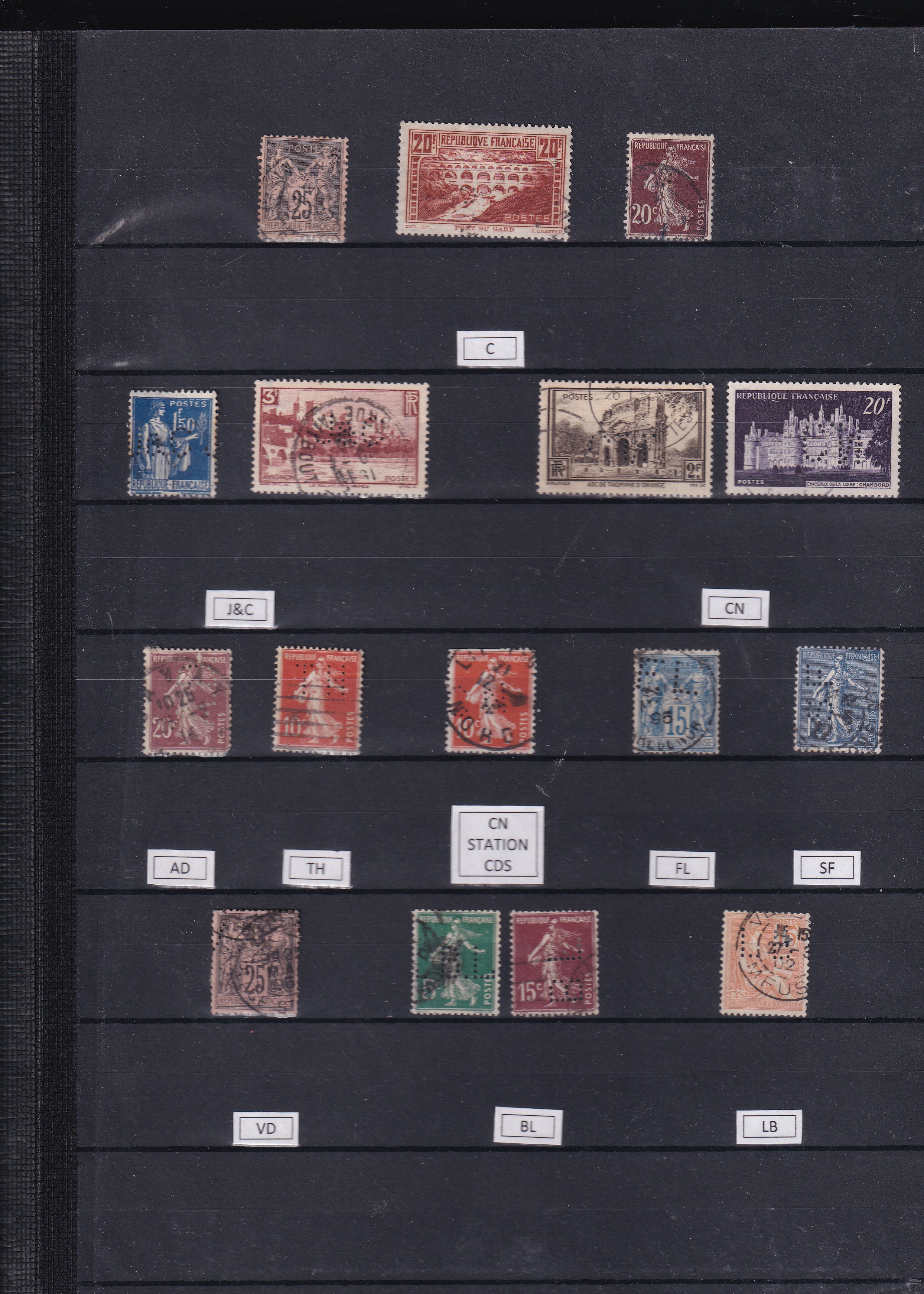 a collection of postage stamps in a book
