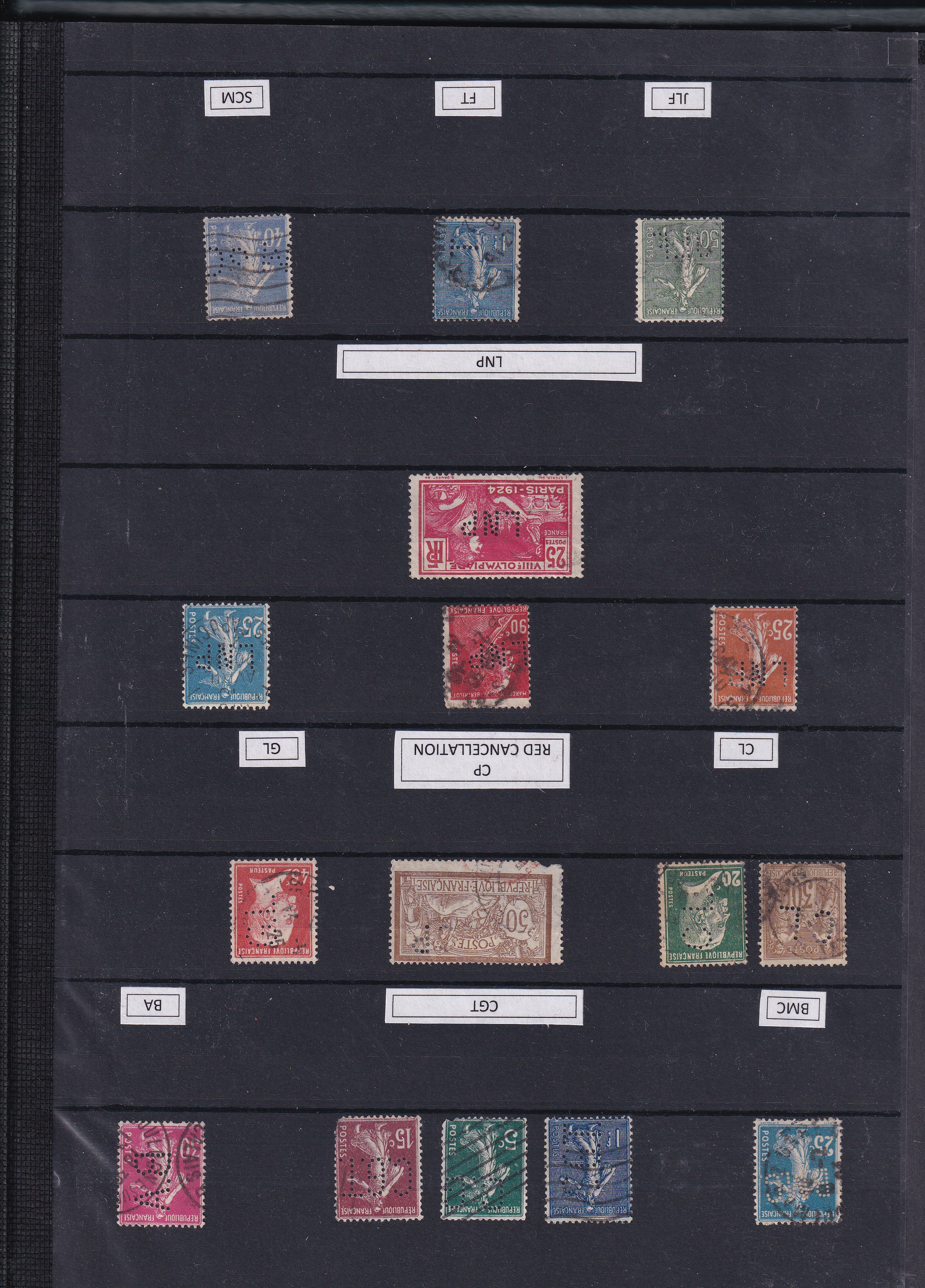 a collection of postage stamps in a binder
