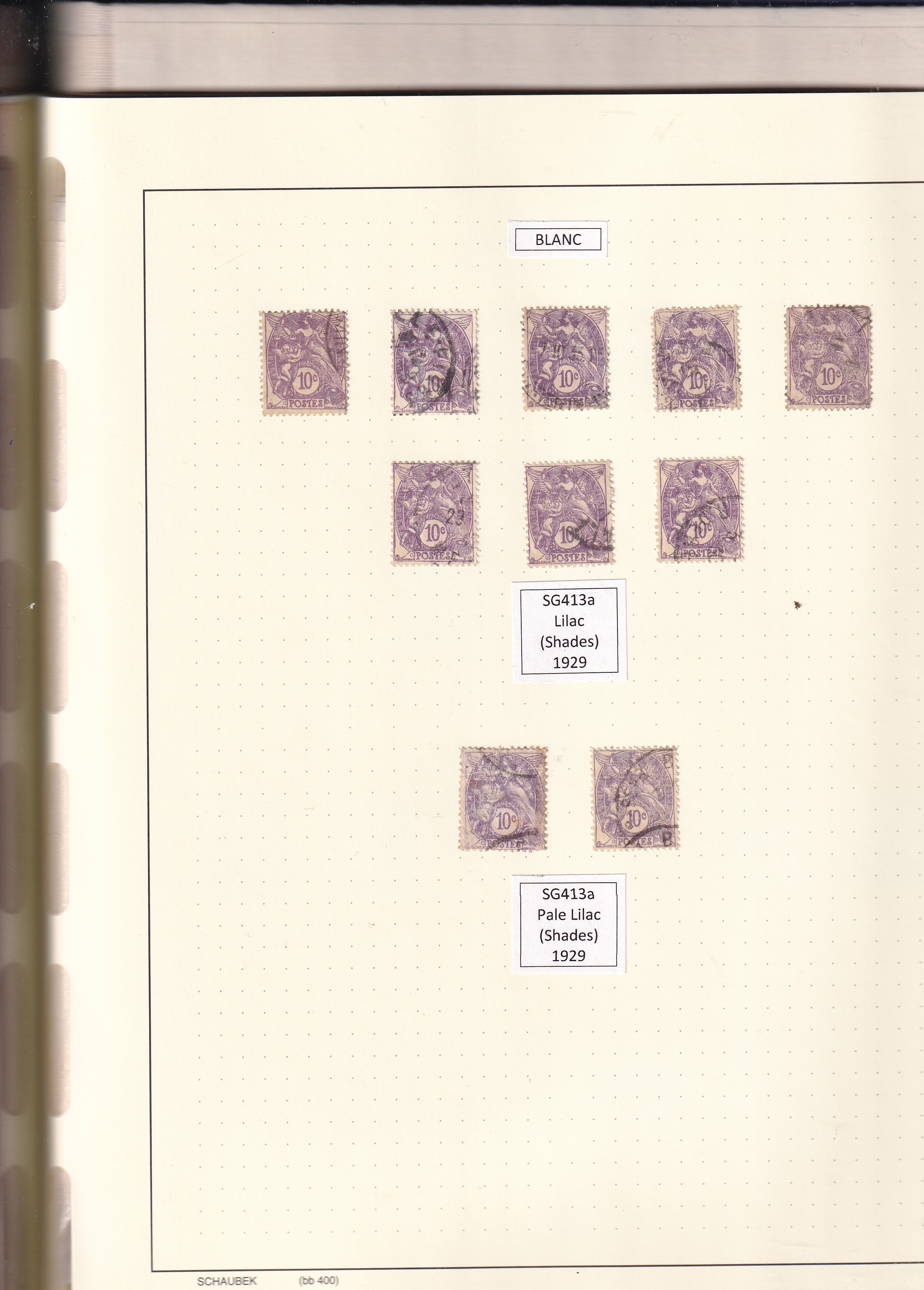 a collection of stamps in a notebook