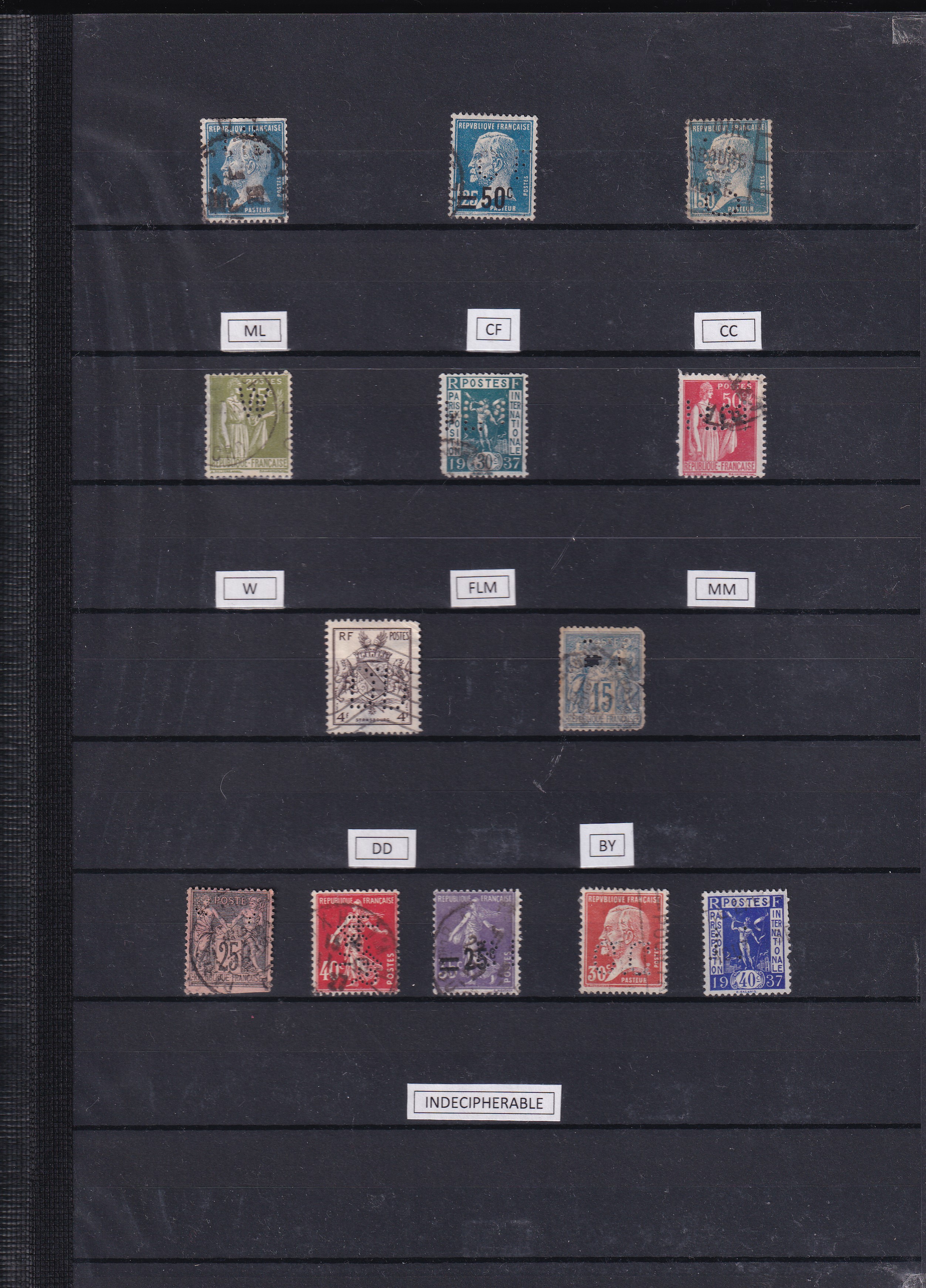 a collection of postage stamps in a binder