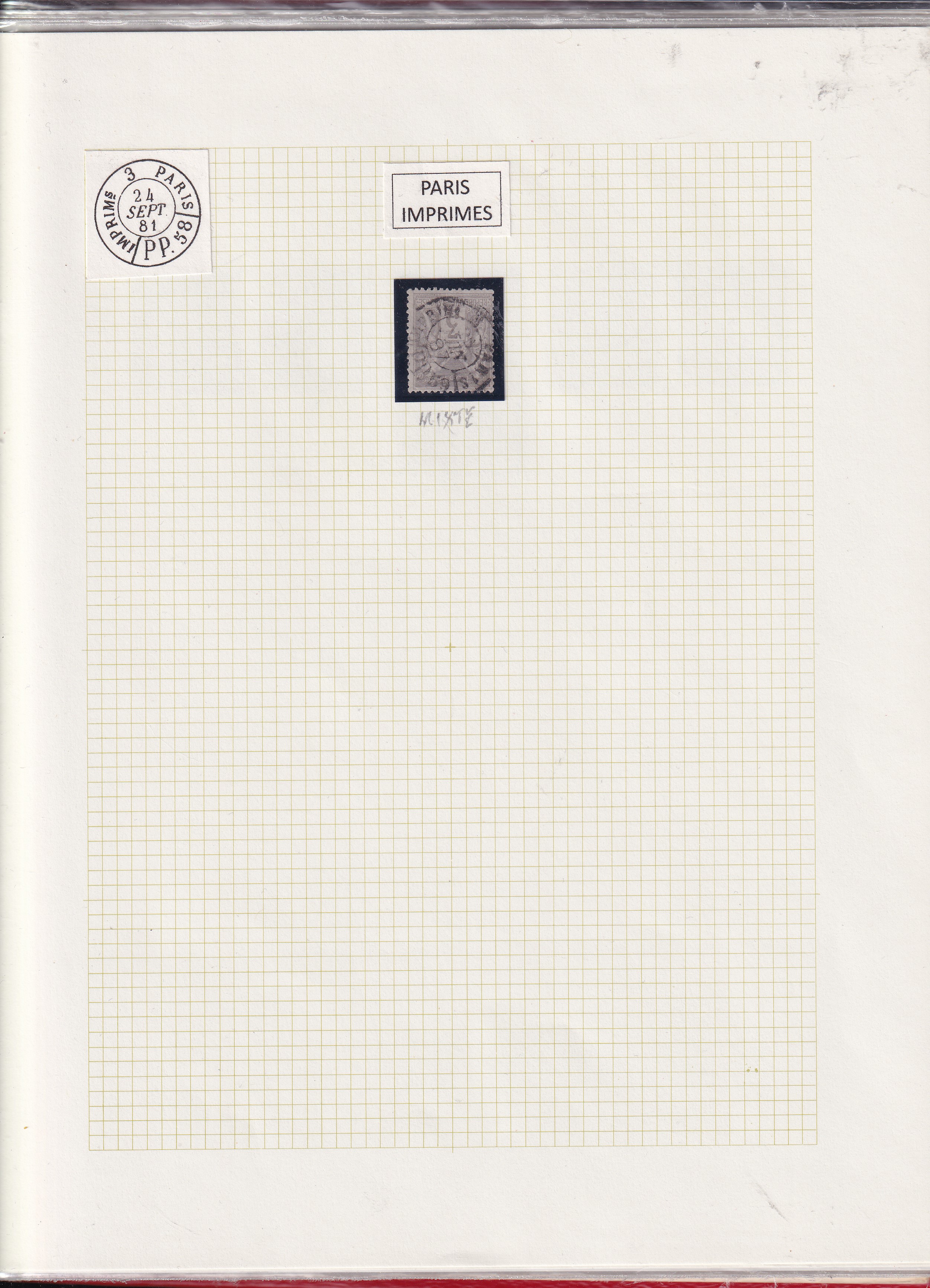 a white paper with a black stamp and a black stamp on it