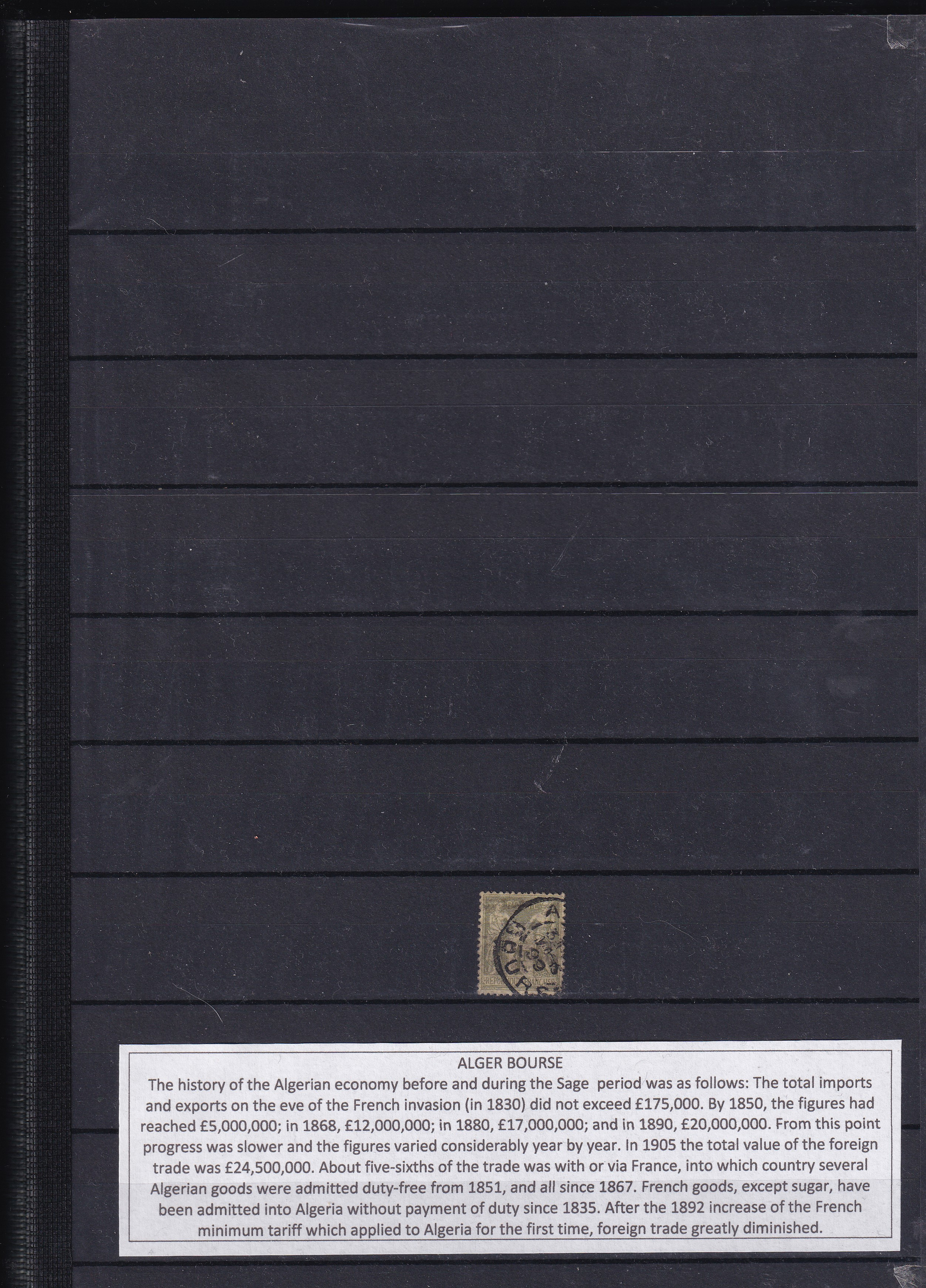 a black folder with a stamp