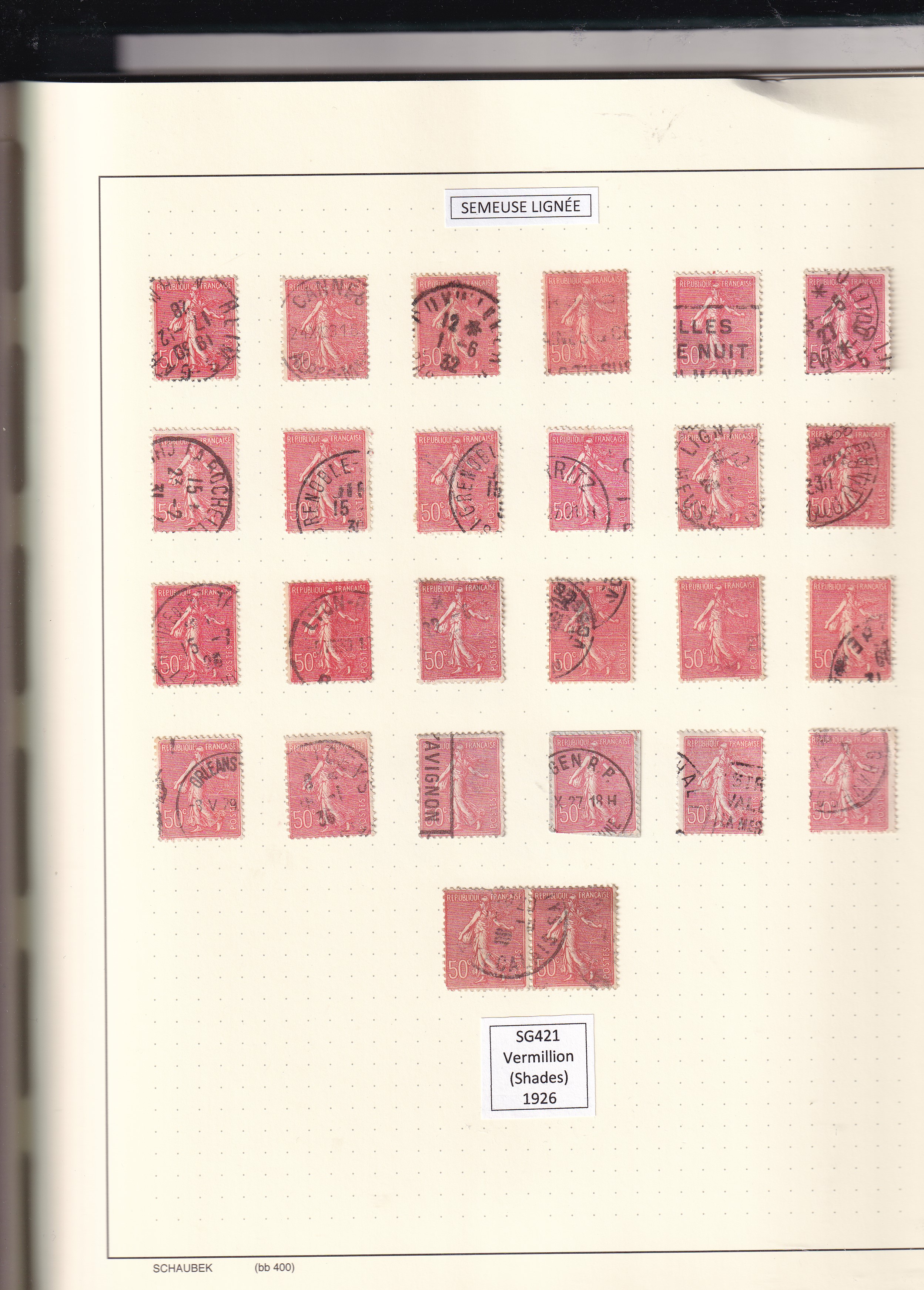 a collection of stamps in a notebook