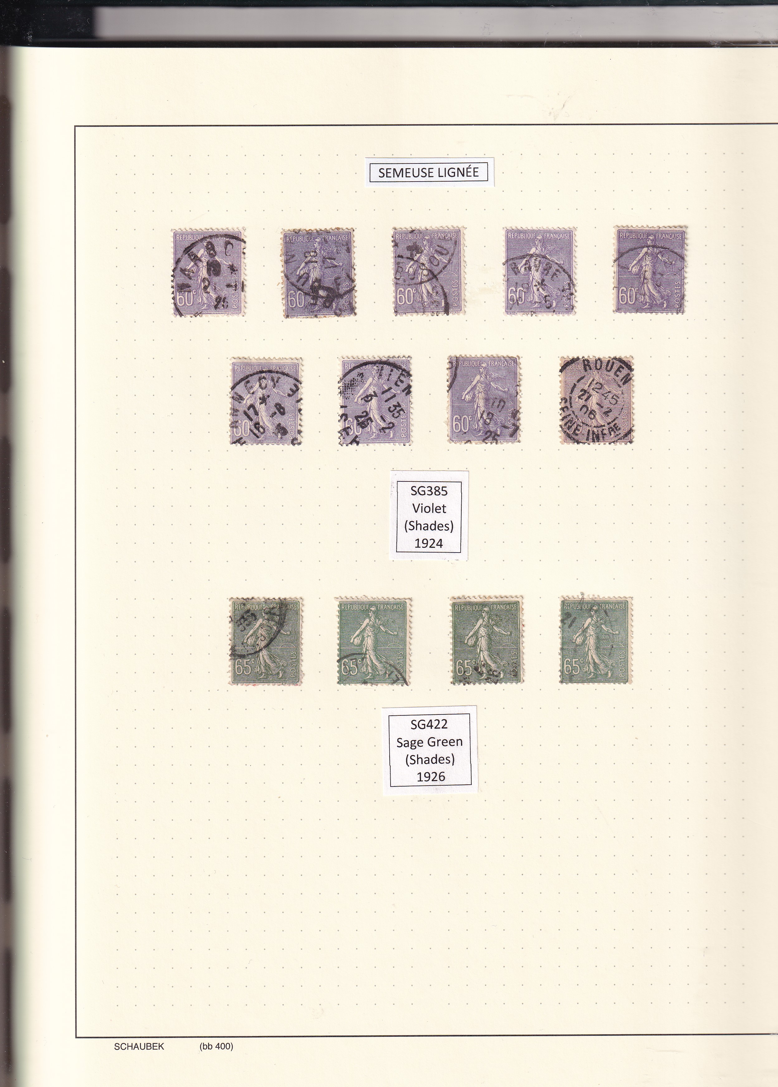 a collection of stamps in a notebook