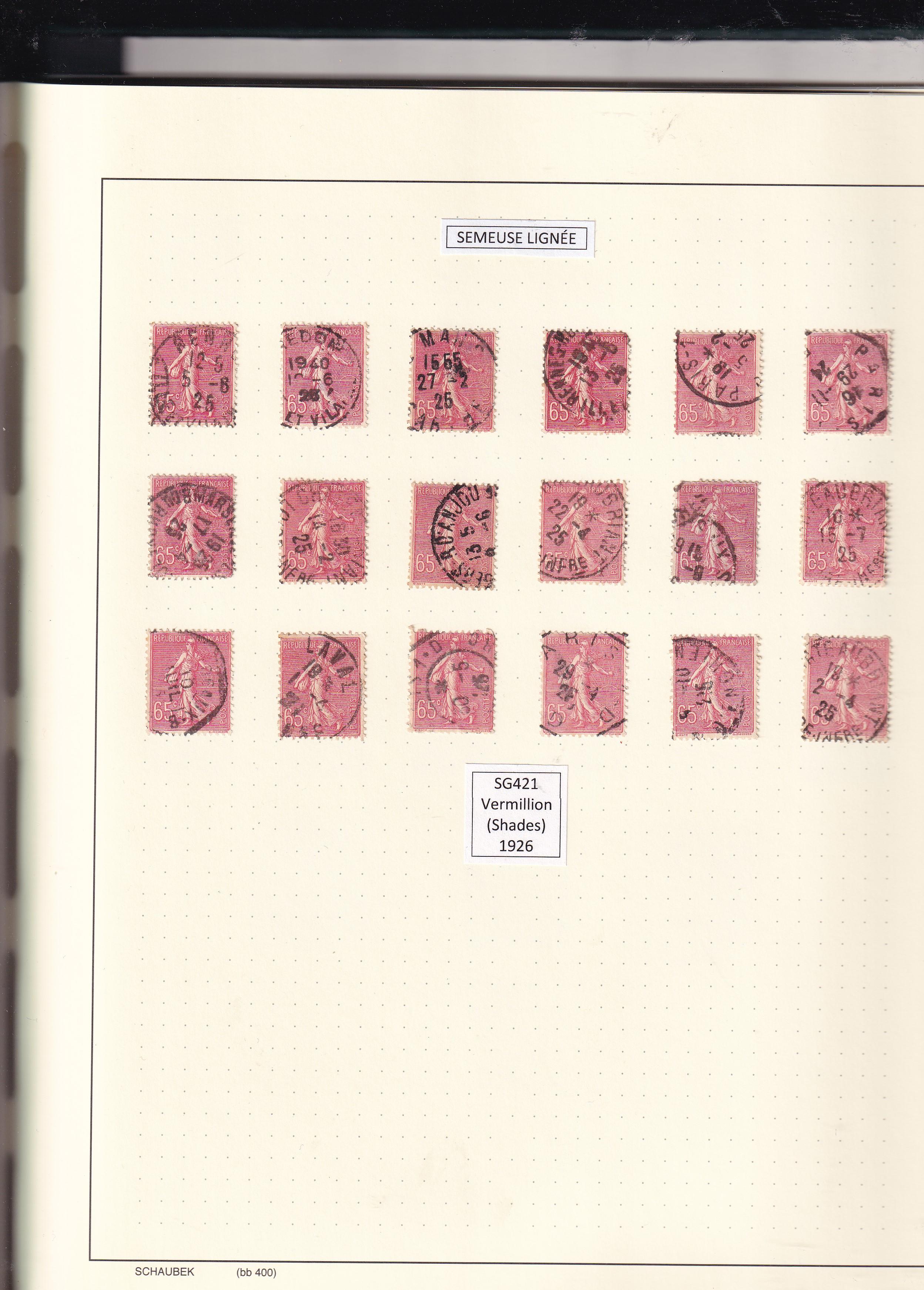a collection of stamps in a notebook