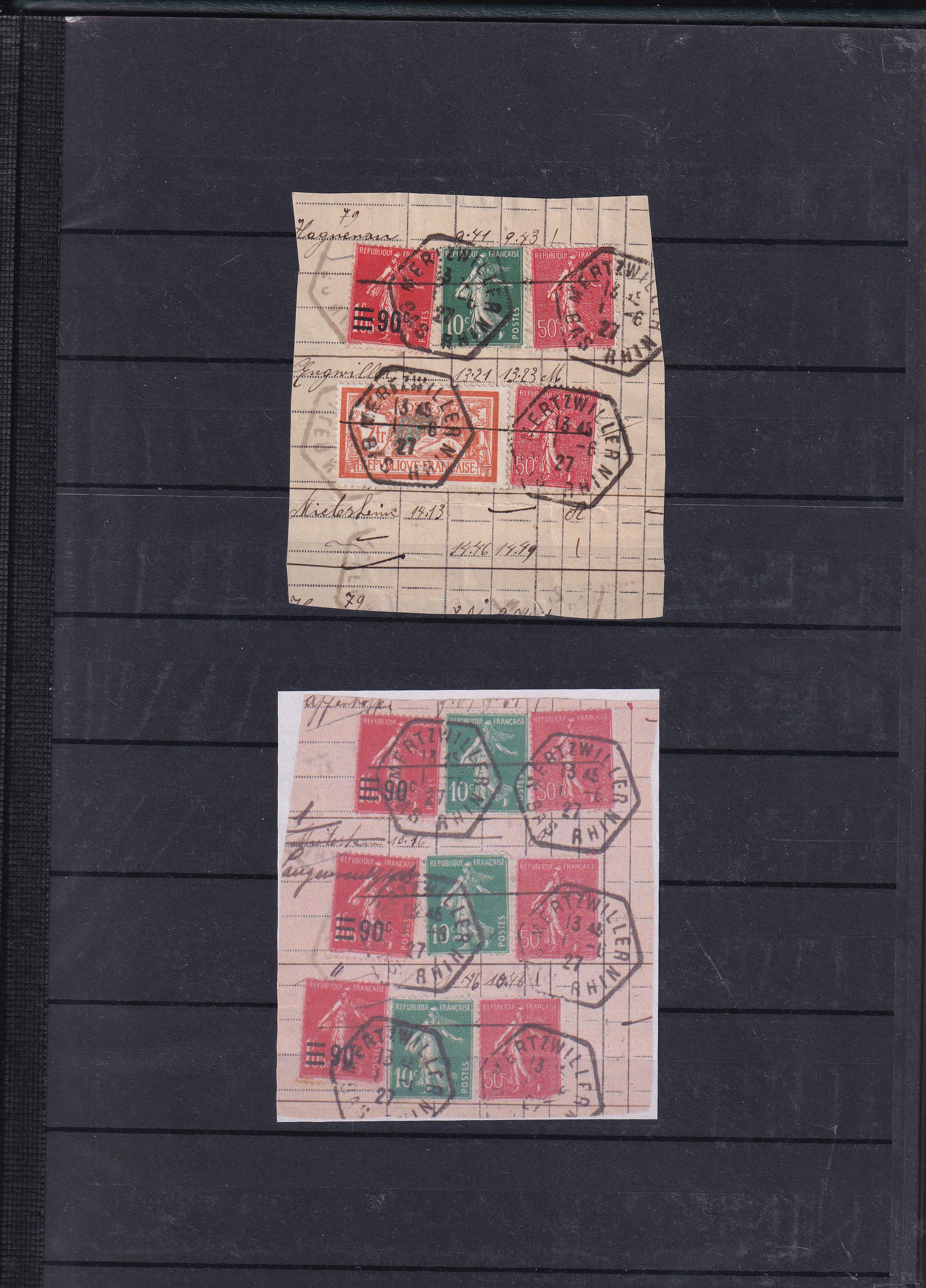 a group of postage stamps on a black surface