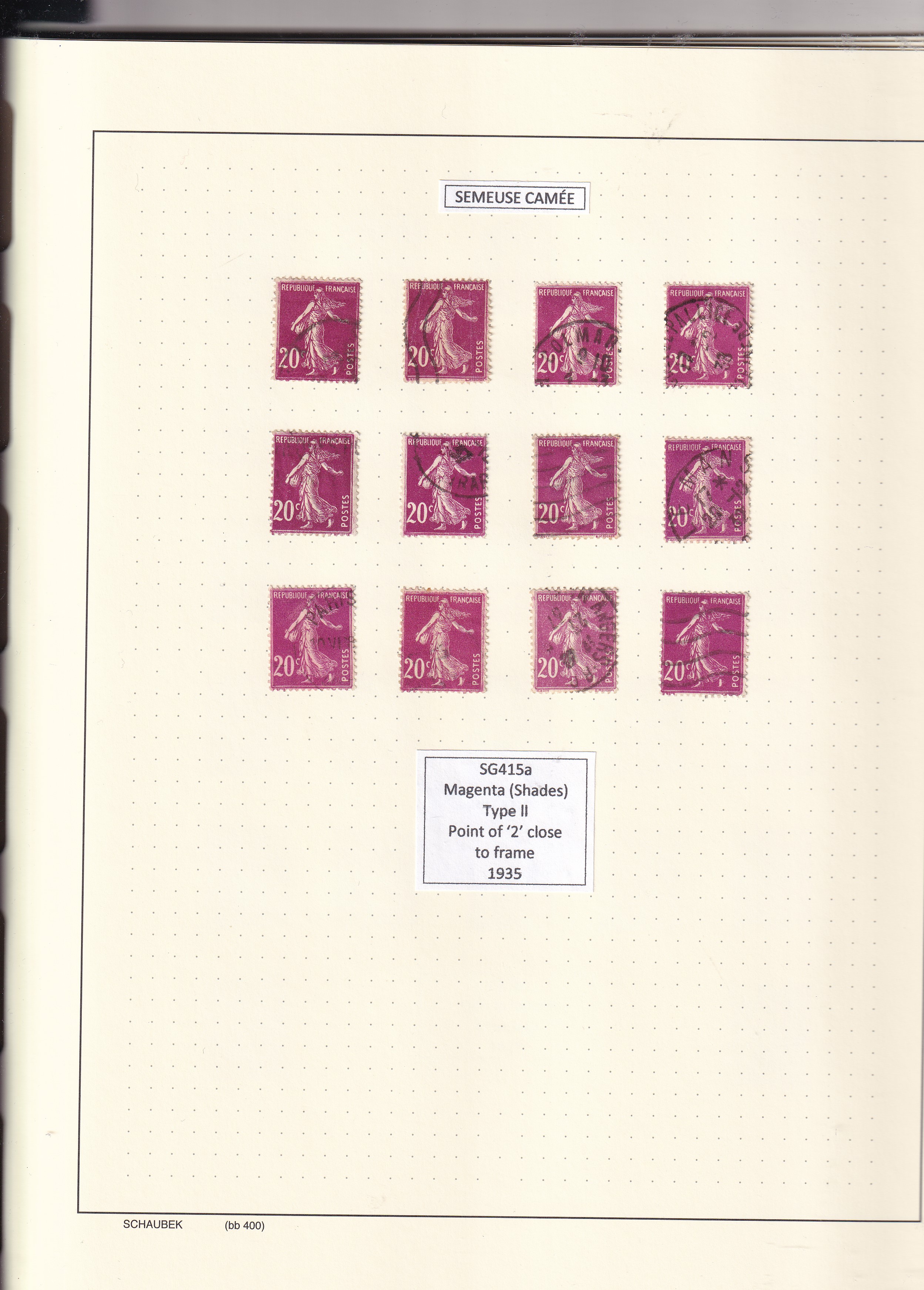 a collection of postage stamps in a notebook