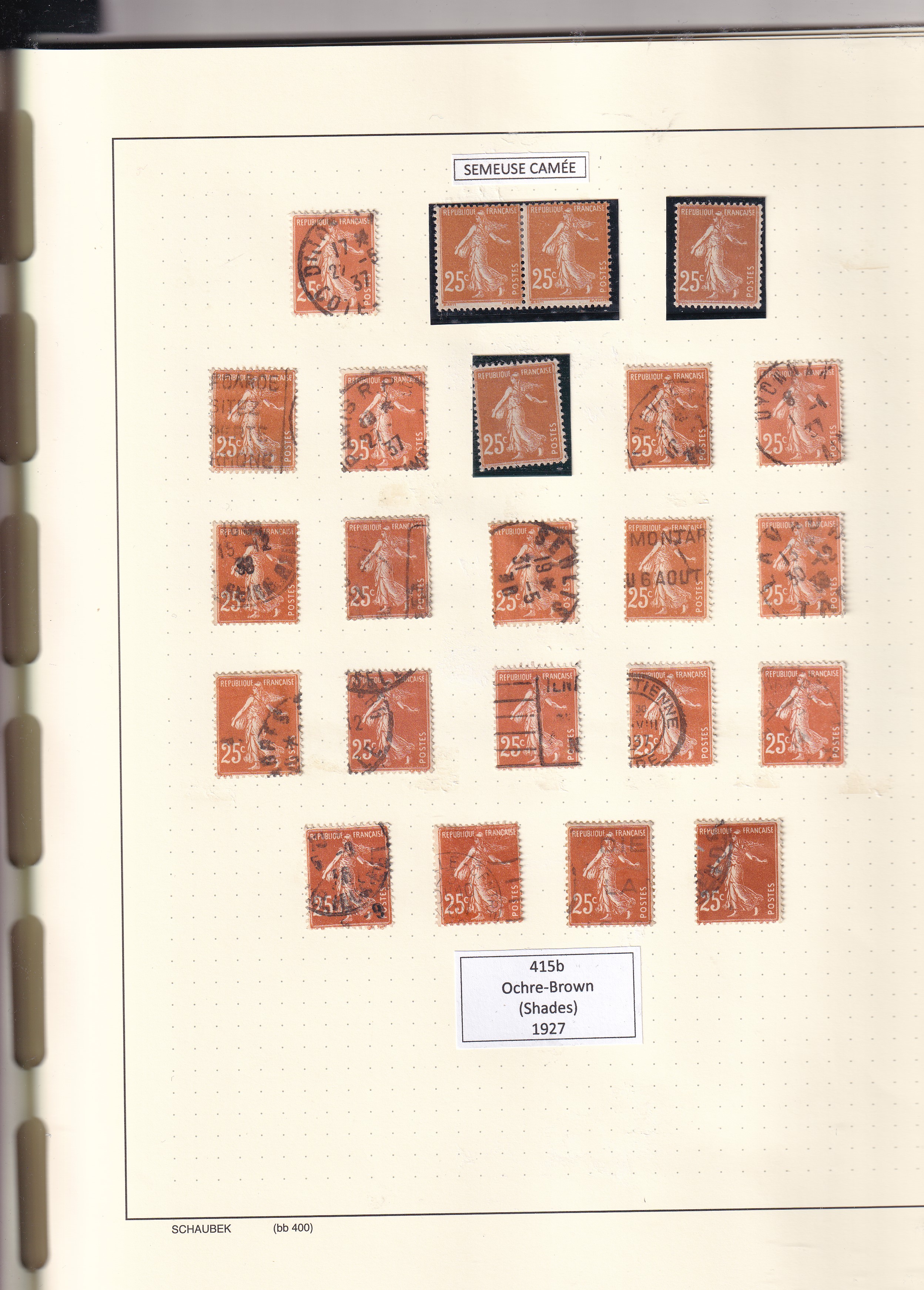 a collection of postage stamps in a notebook