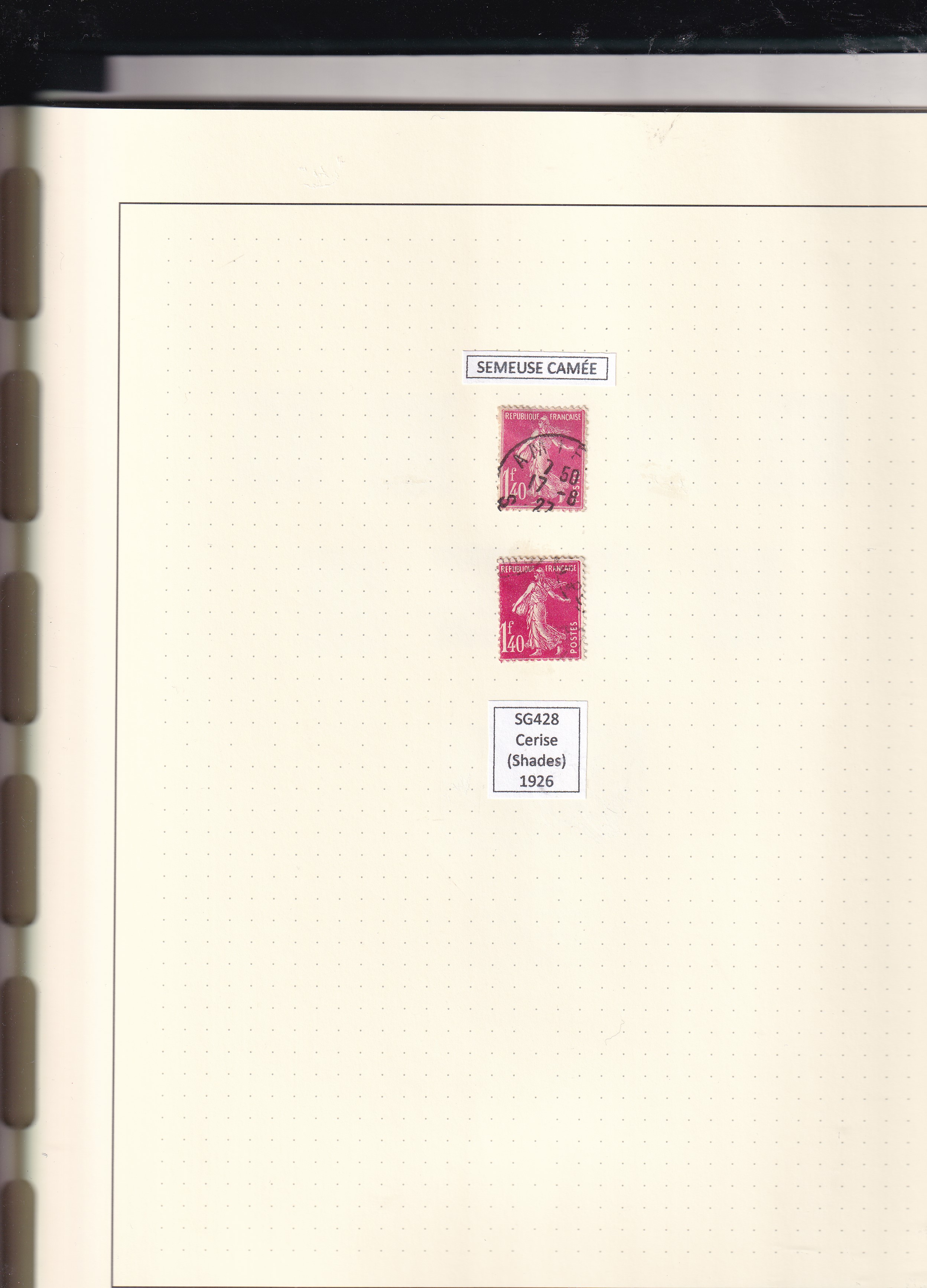 a page of a notebook with stamps