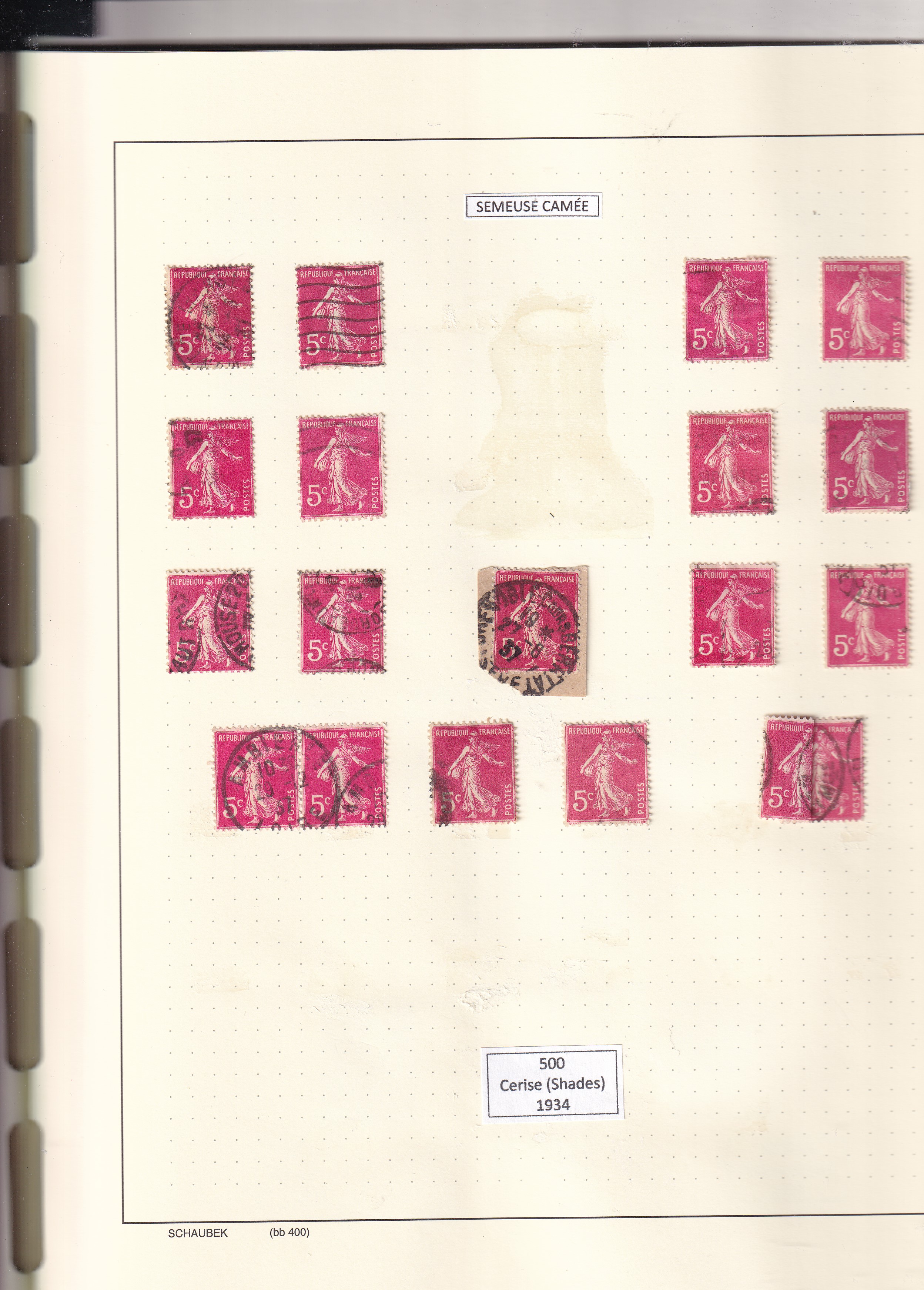 a collection of stamps in a notebook