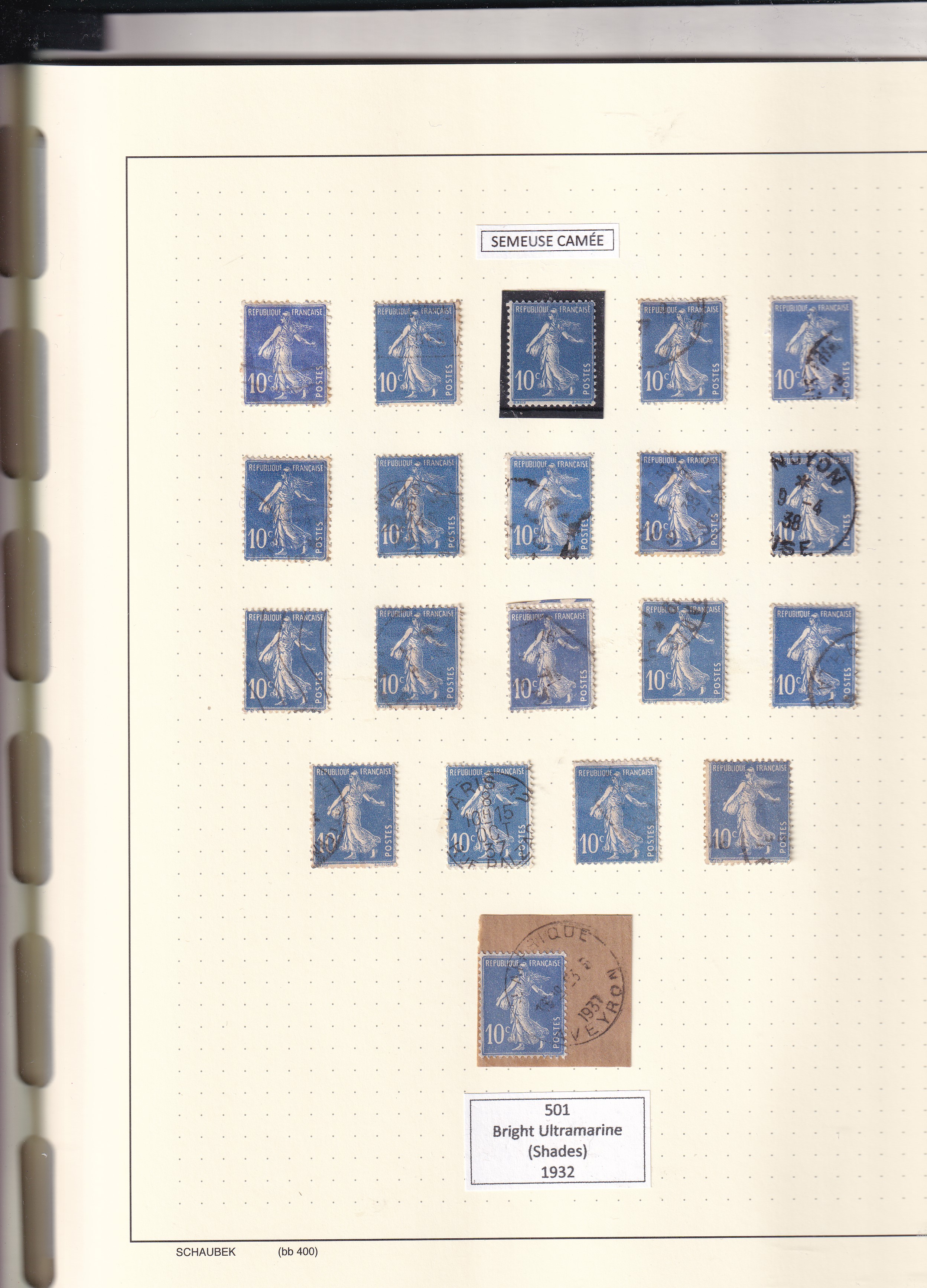 a collection of postage stamps in a notebook