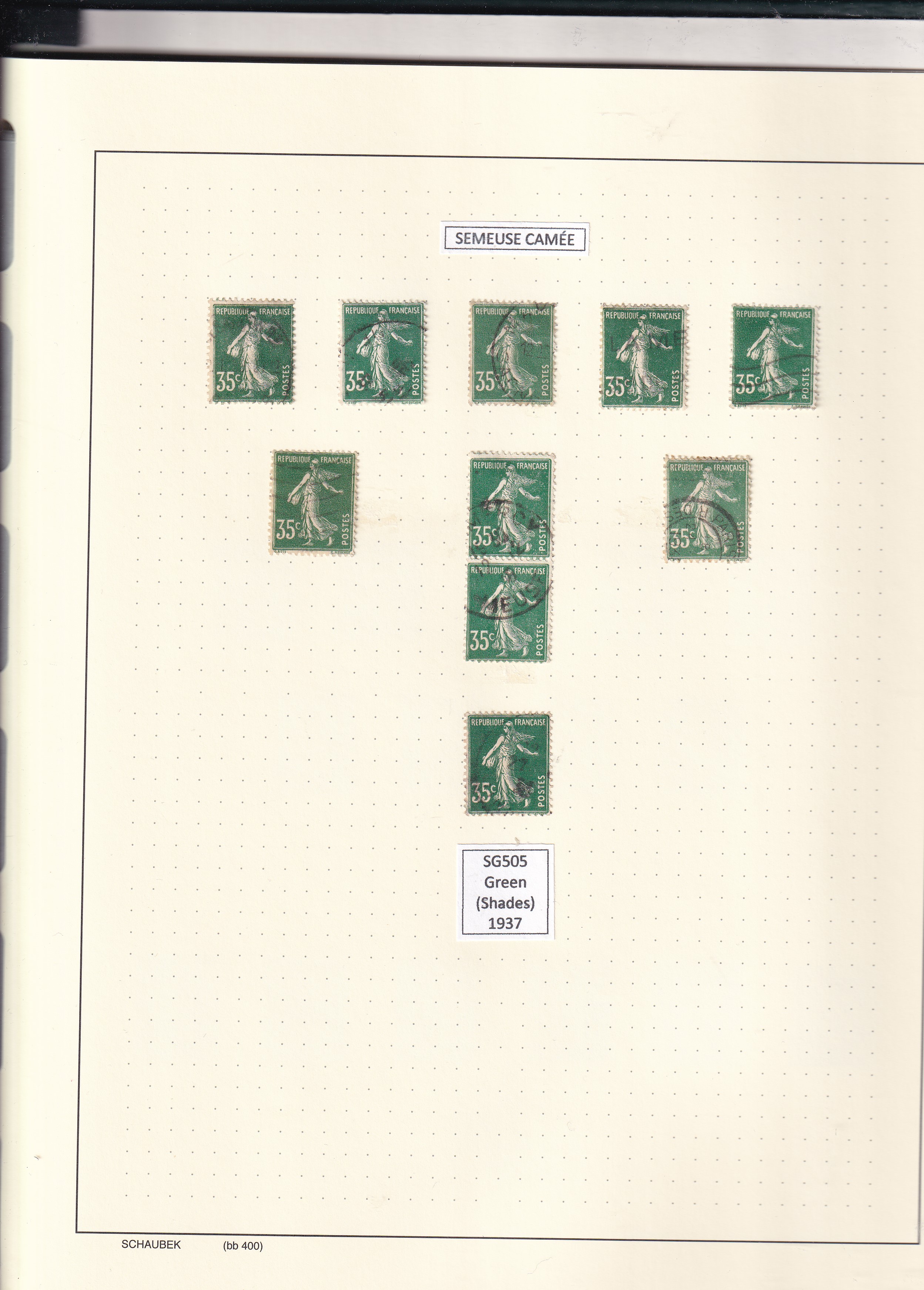 a collection of postage stamps in a notebook