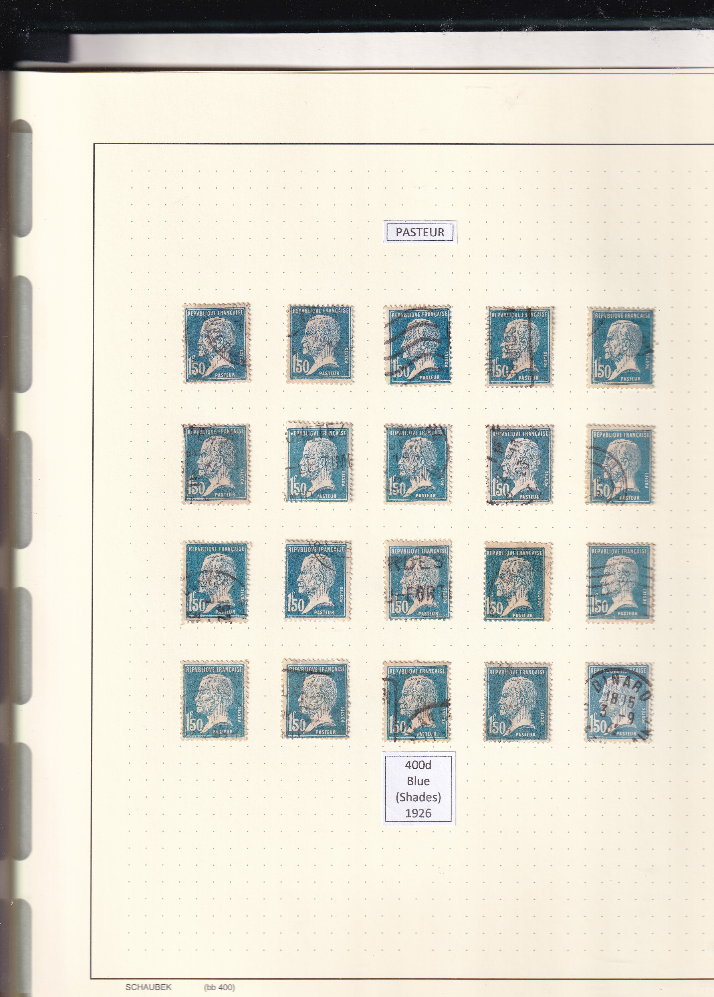 a collection of postage stamps in a notebook