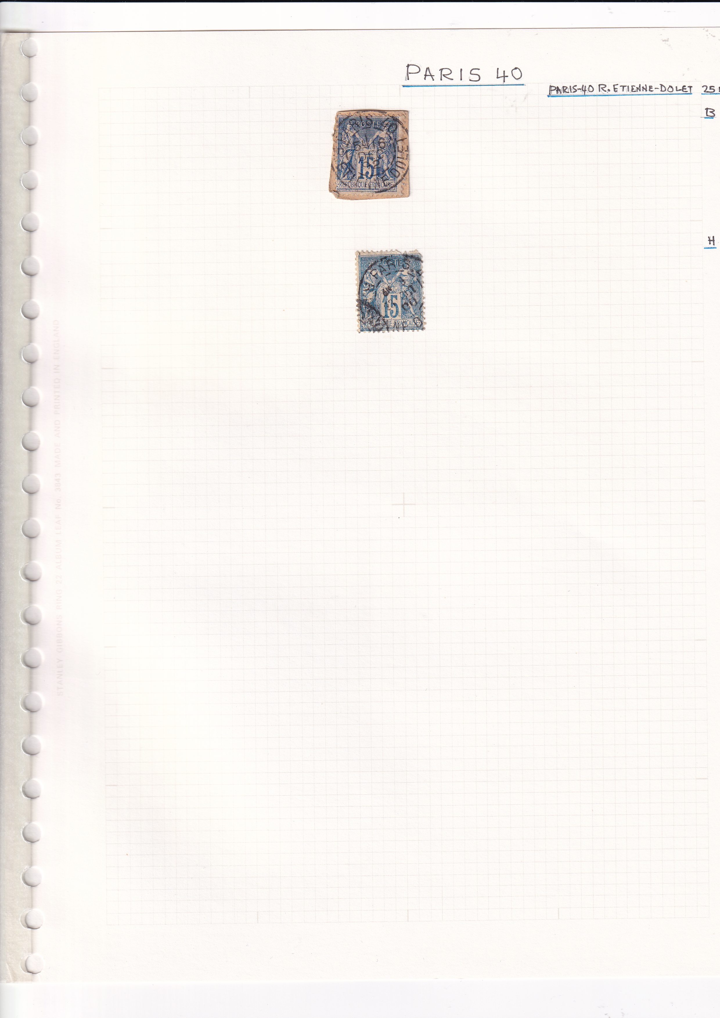 a white sheet of paper with a couple of blue and brown stamps