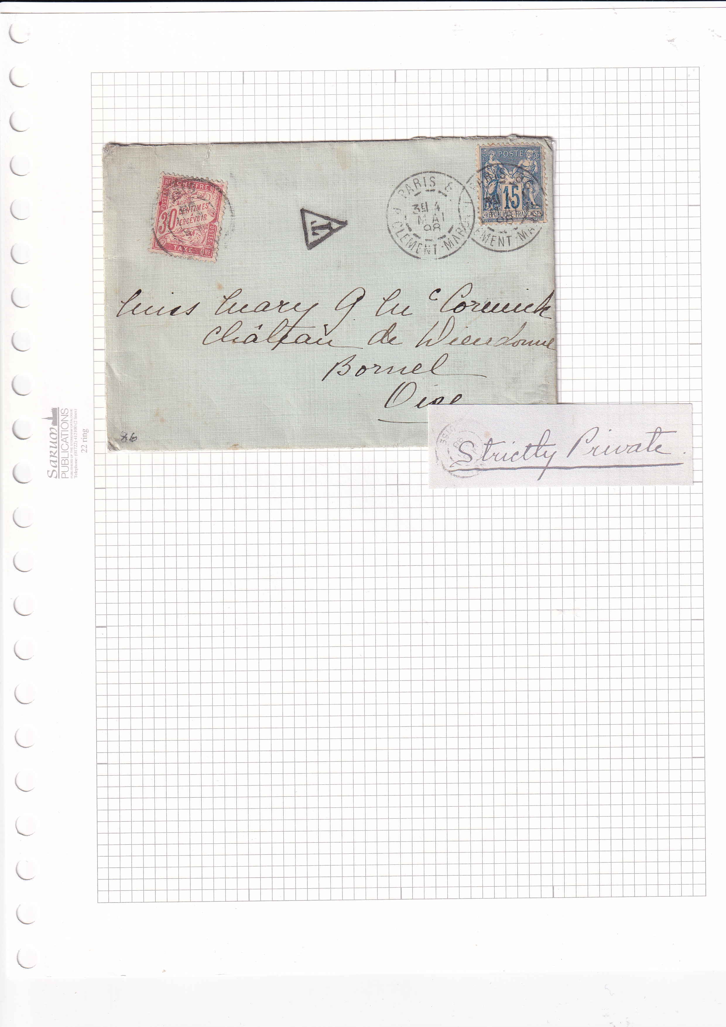 a paper with a letter and a piece of paper with a letter