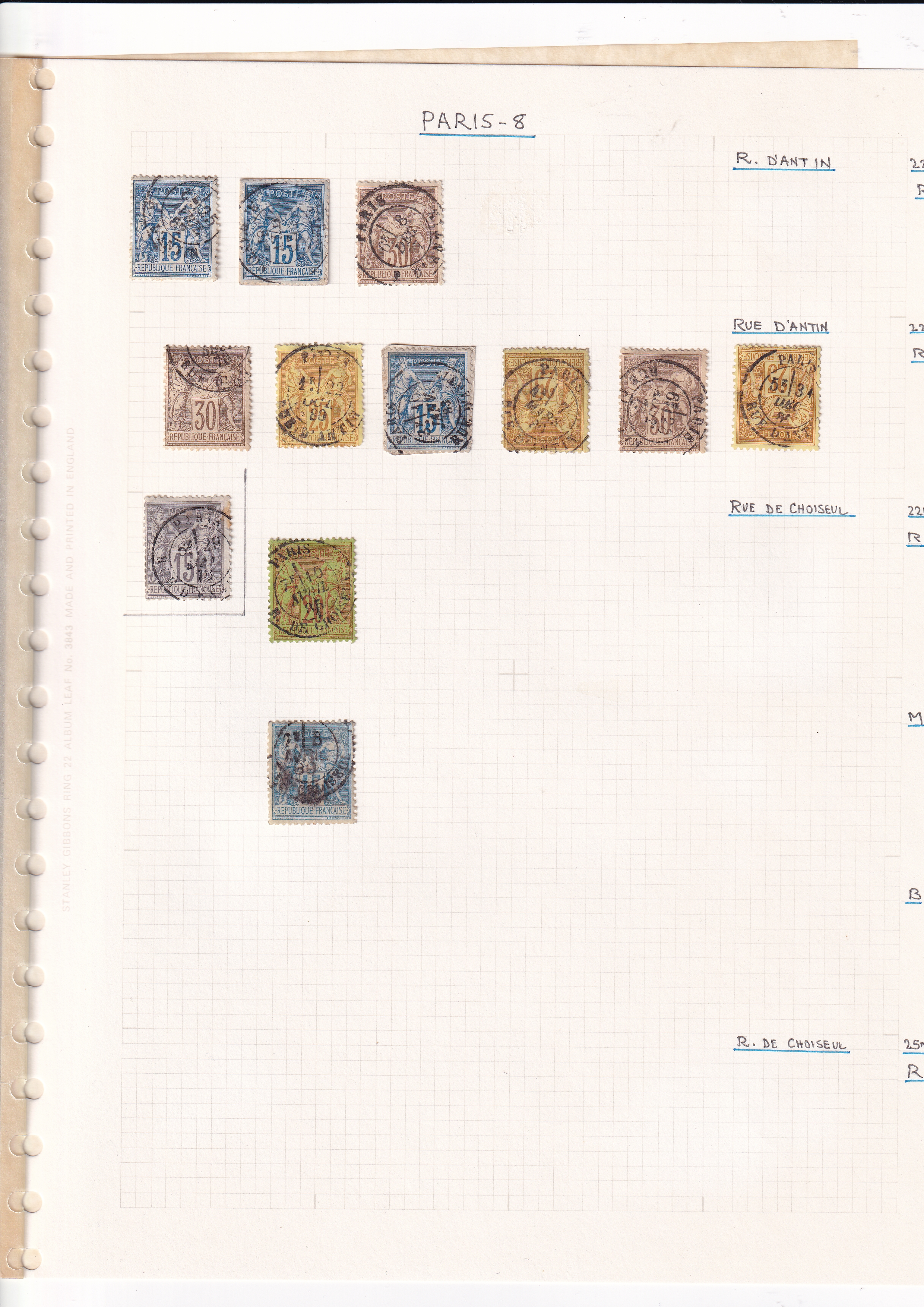 a collection of stamps on a white sheet of paper