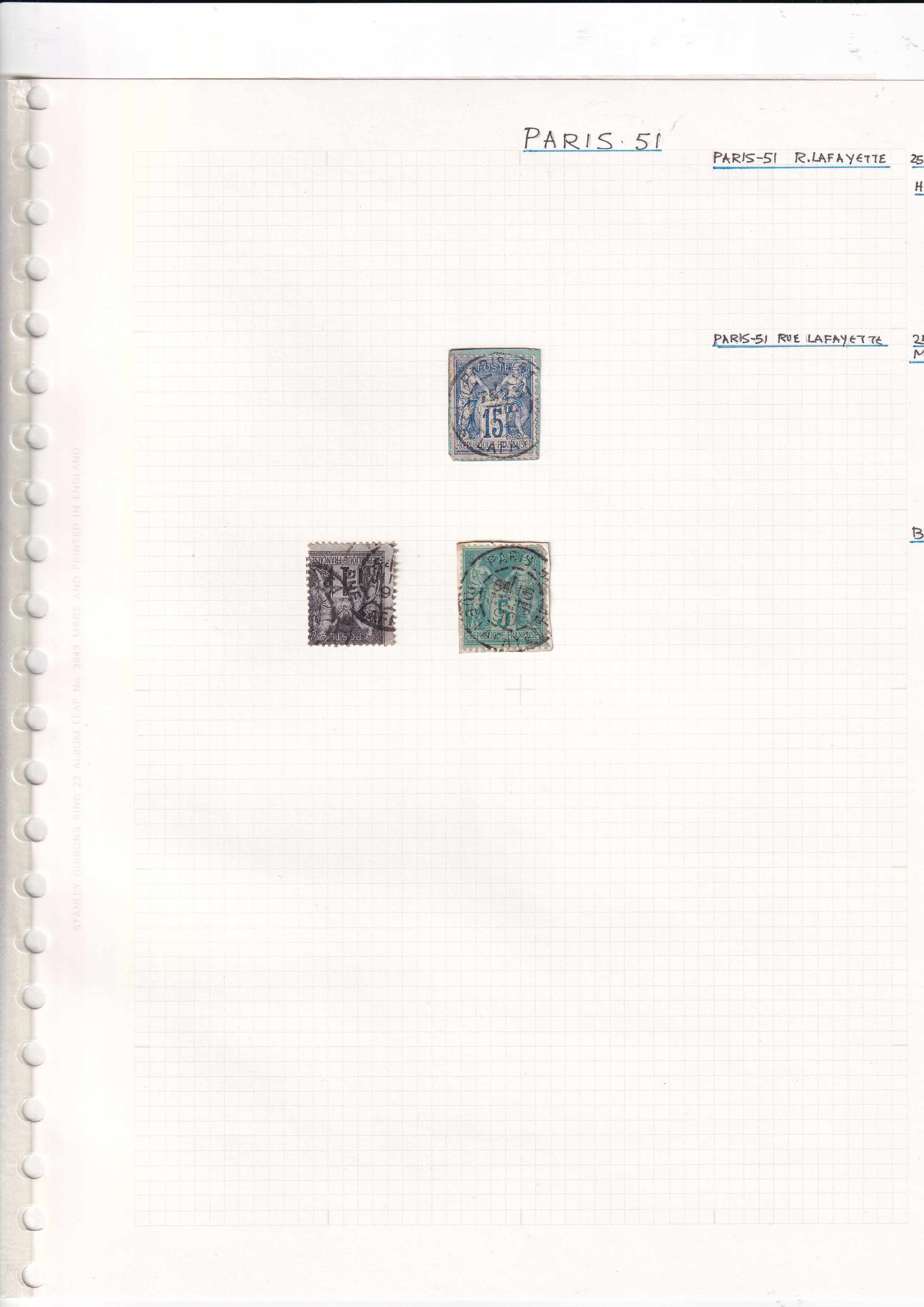 a group of stamps on a white sheet of paper