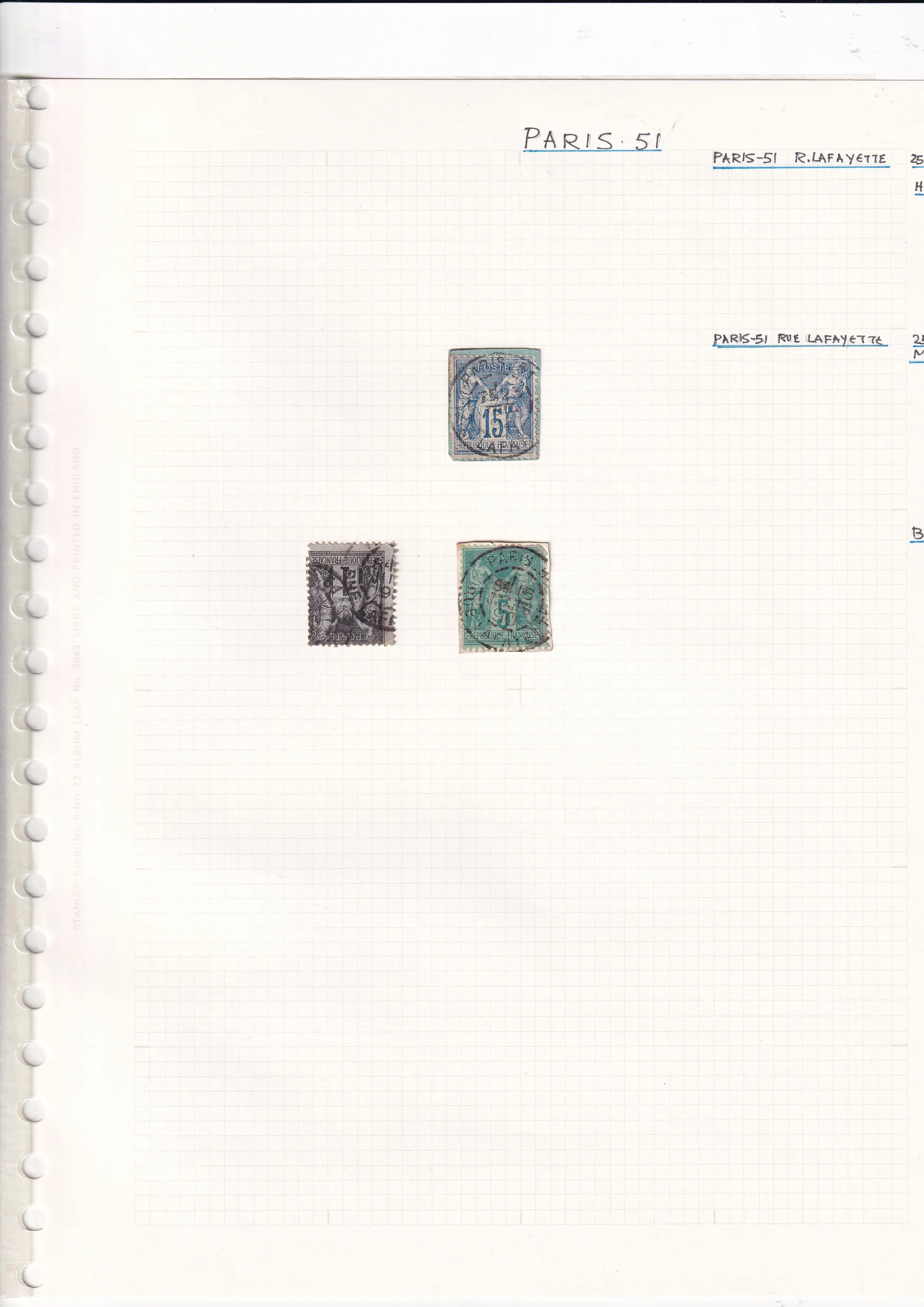 a group of stamps on a white sheet of paper