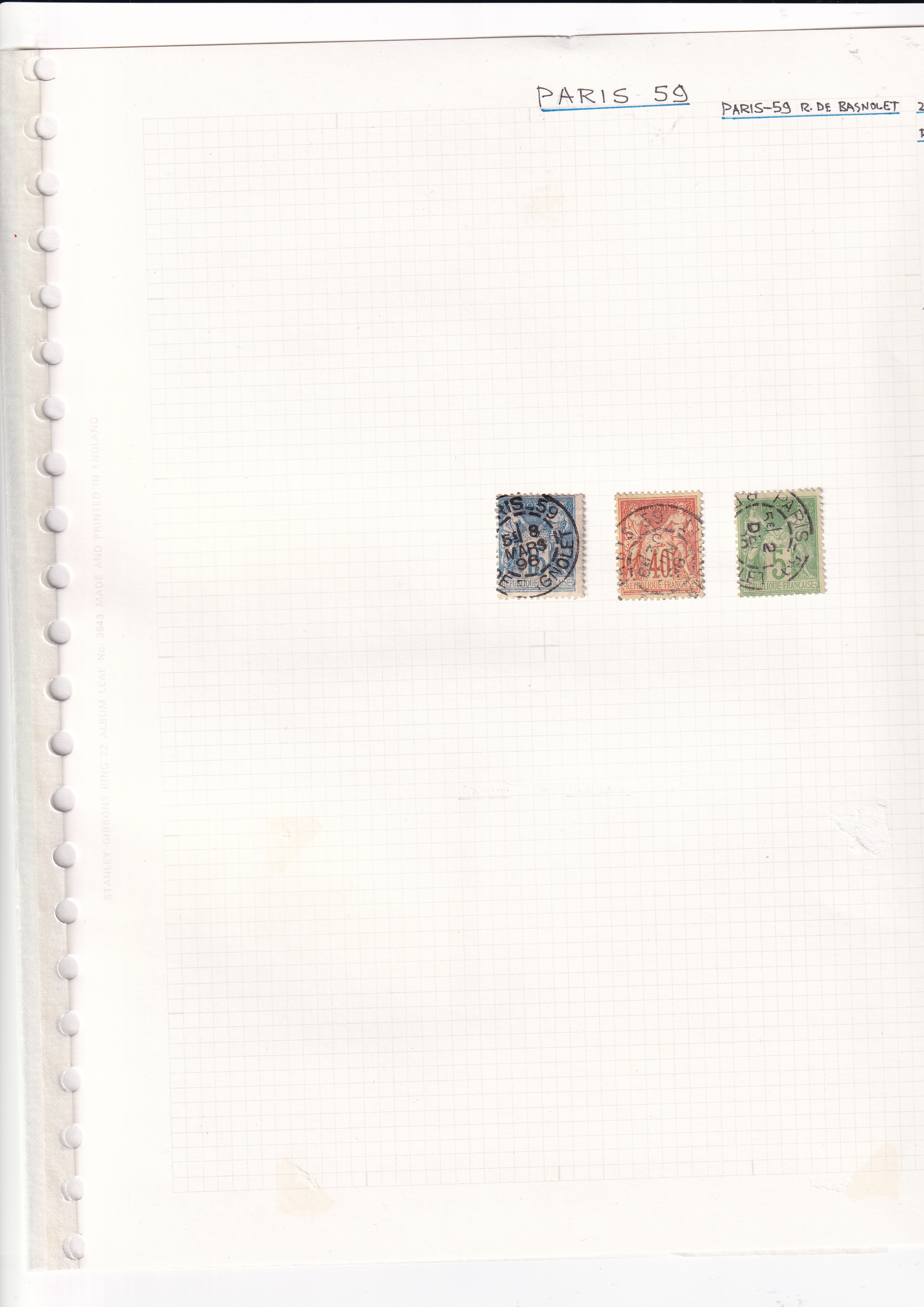 a group of stamps on a white paper
