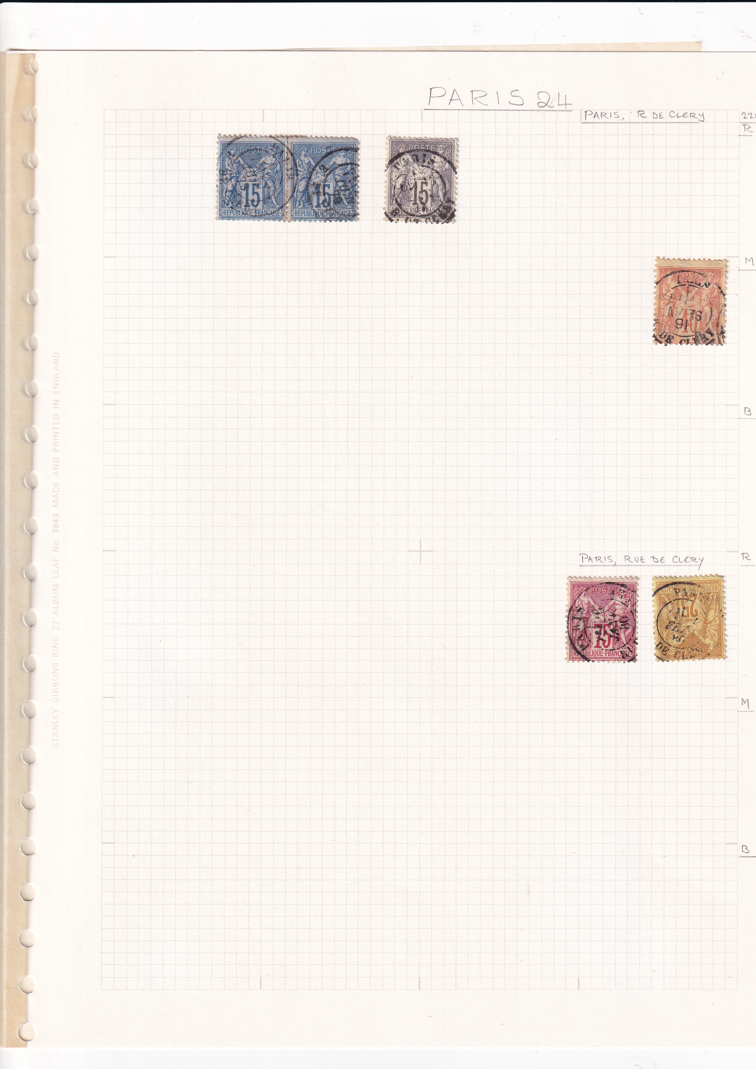 a page of a notebook with stamps