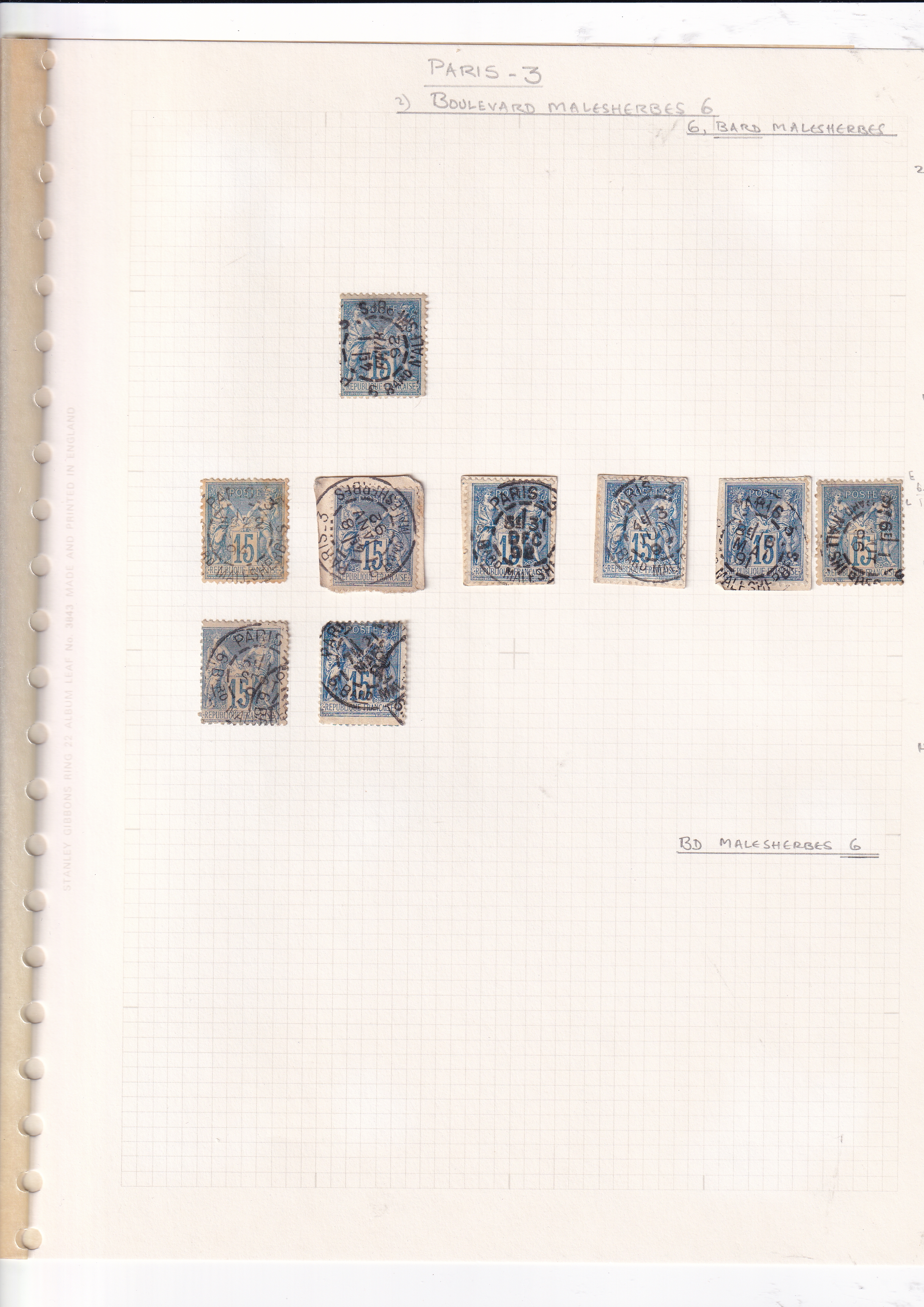 a collection of stamps in a notebook